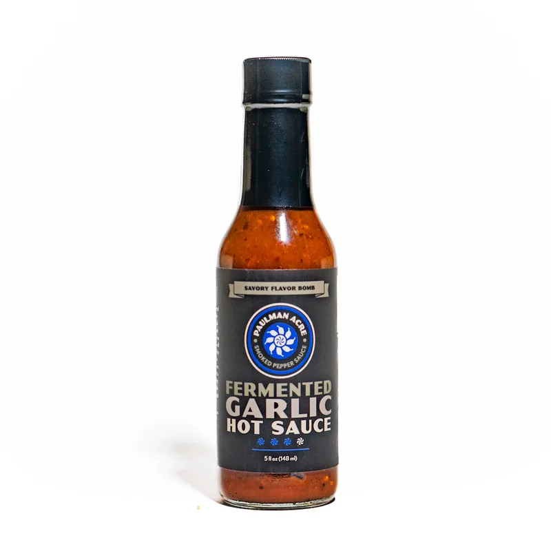 Paulman Acre - Fermented Garlic Hot Sauce by California Hot Sauce Solutions hot sauce bottle