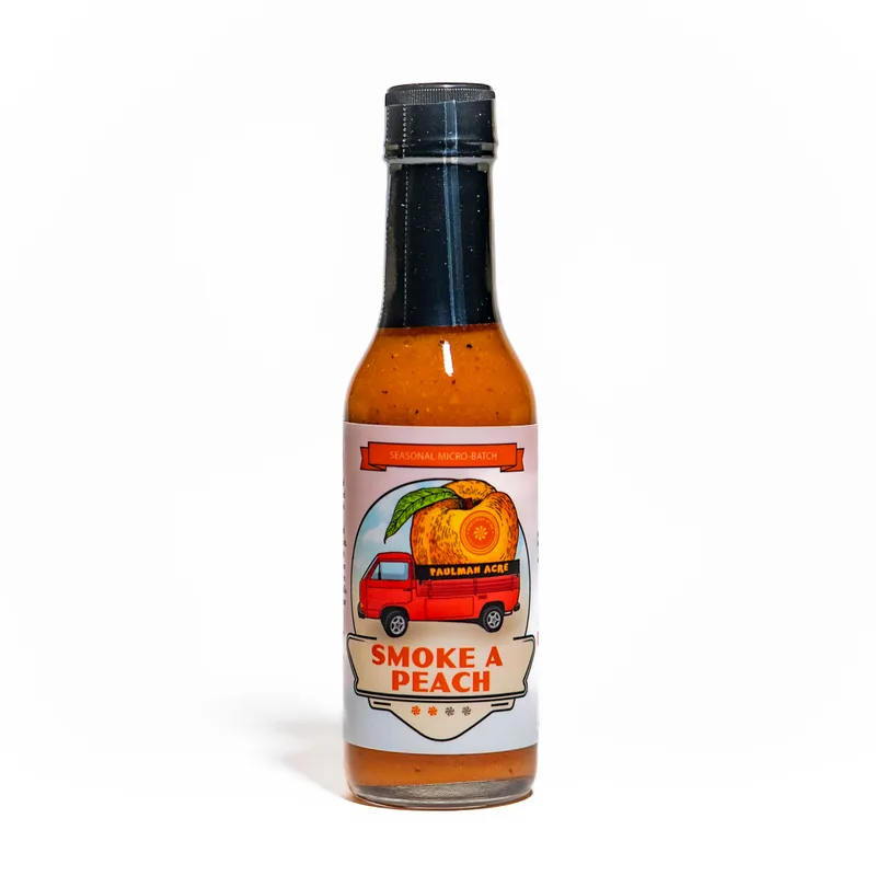 Paulman Acre - Smoke a Peach Hot Sauce by California Hot Sauce Solutions hot sauce bottle