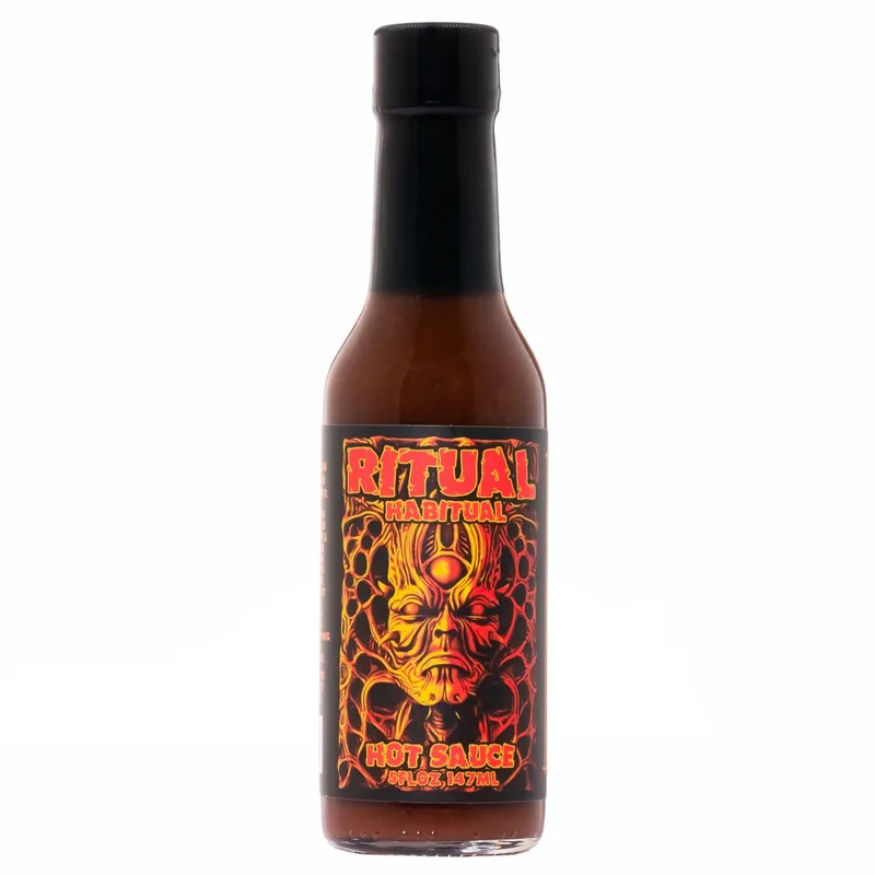 Ritual Habitual - The Perfect Marinade, Dipping, and Finishing Hot Sauce by Hellfire Hot Sauce hot sauce bottle