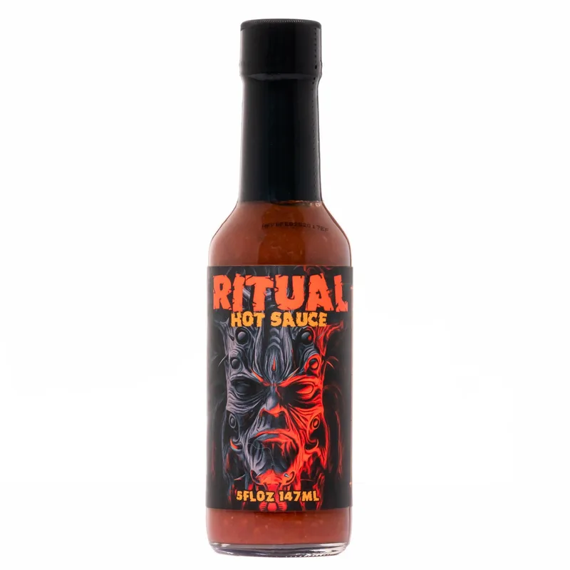 Ritual Caribbean Style - Award Winning Fruit-Based Hot Sauce by Hellfire Hot Sauce hot sauce bottle