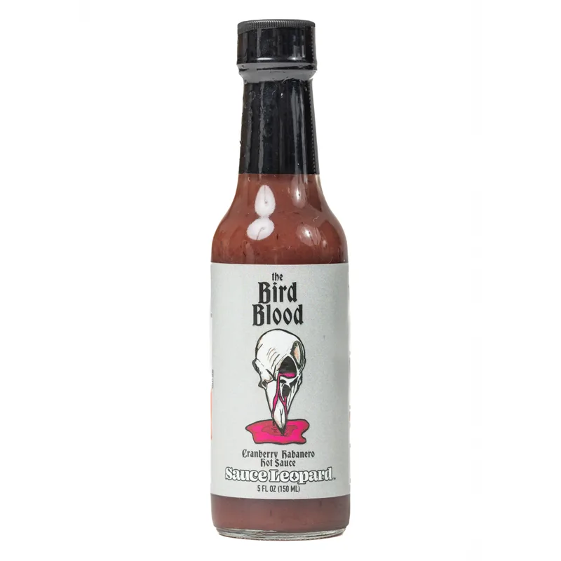 The Bird Blood - Cranberry Habanero Sauce by sauceleopard hot sauce bottle