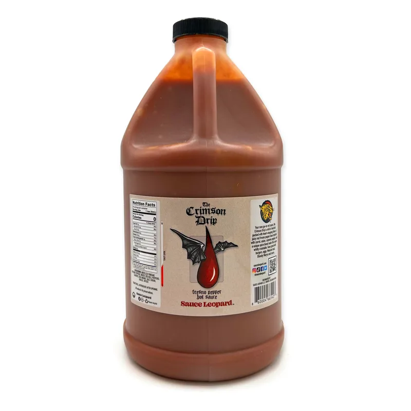 The Crimson Drip 1/2 Gallon Jug by Sauce Leopard hot sauce bottle