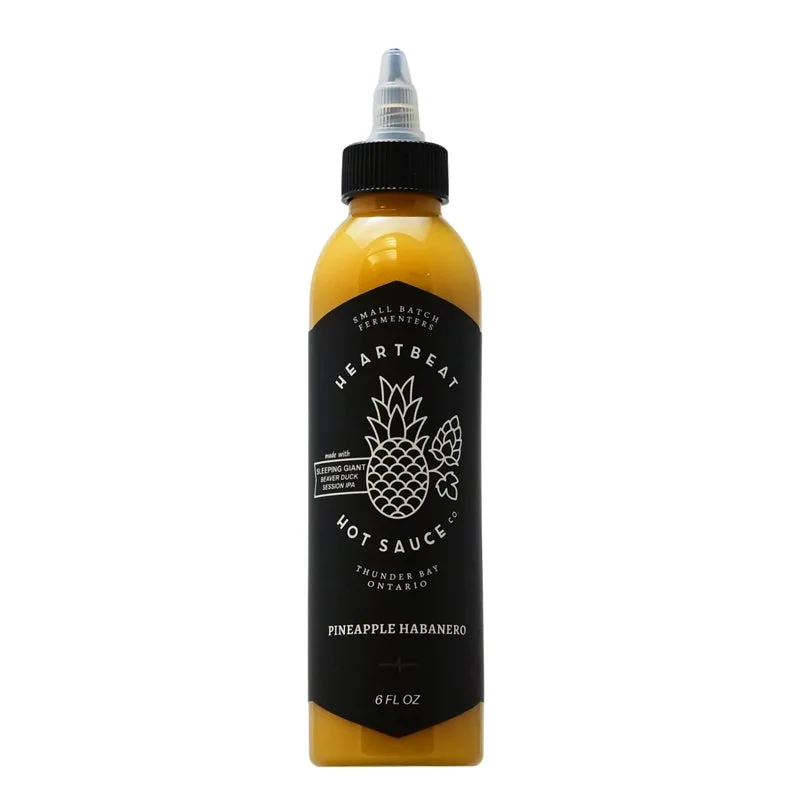 Heartbeat Pineapple Habanero Hot Sauce by Heartbeat Hot Sauce Co. hot sauce bottle