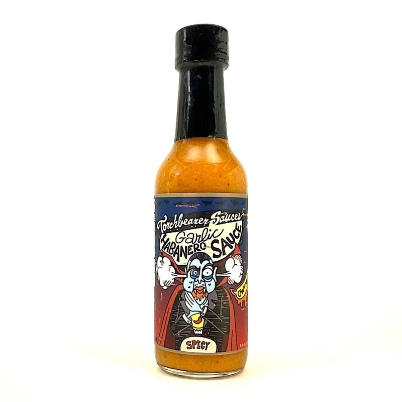 Torchbearer Garlic Habanero Hot Sauce by TorchBearer Sauces hot sauce bottle