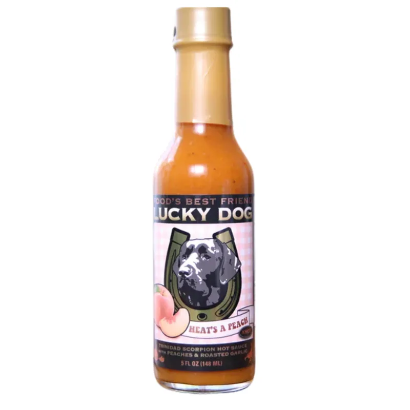 Lucky Dog Heat's a Peach Hot Sauce by Lucky Dog Hot Sauce hot sauce bottle